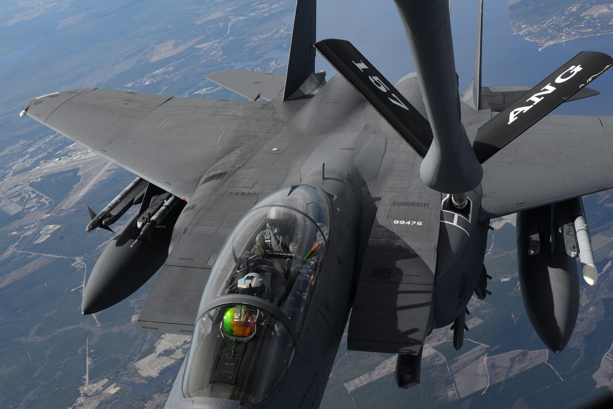 U.S. Air Force pilots in an F-15E Strike Eagle from Seymour Johnson Air Force Base, N.C., receive fuel from a New Hampshire Air National Guard KC-135R over North Carolina, March 17, 2015. (U.S. Air National Guard photo by Airman Ashlyn J. Correia/ RELEASED)