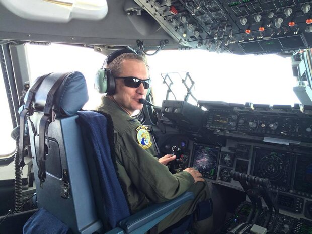 Colonel James Fontanella, 315th Airlift Wing commander is at the controls of a C-17 Globemaster III during his fini flight March 13, 2015 at Joint Base Charleston, S.C. Fontanella will be leaving the 315th AW to become the commander of the Force Generation Center at Robins Air Force Base, Ga. His change of command his currently scheduled for April 11, 2015. (Courtesy photo / Maj. Suzie Gordon)