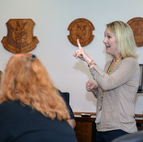 Erin Locke, 23d Medical Group health promotion dietitian, speaks to members of the 93d Air Ground Operations Wing during their Comprehensive Airmen Fitness Day March 13, 2015, at Moody Air Force Base, Ga. CAF Day is held quarterly and this one focused on the physical pillar of fitness. (U.S. Air Force photo by Airman Greg Nash/Released)