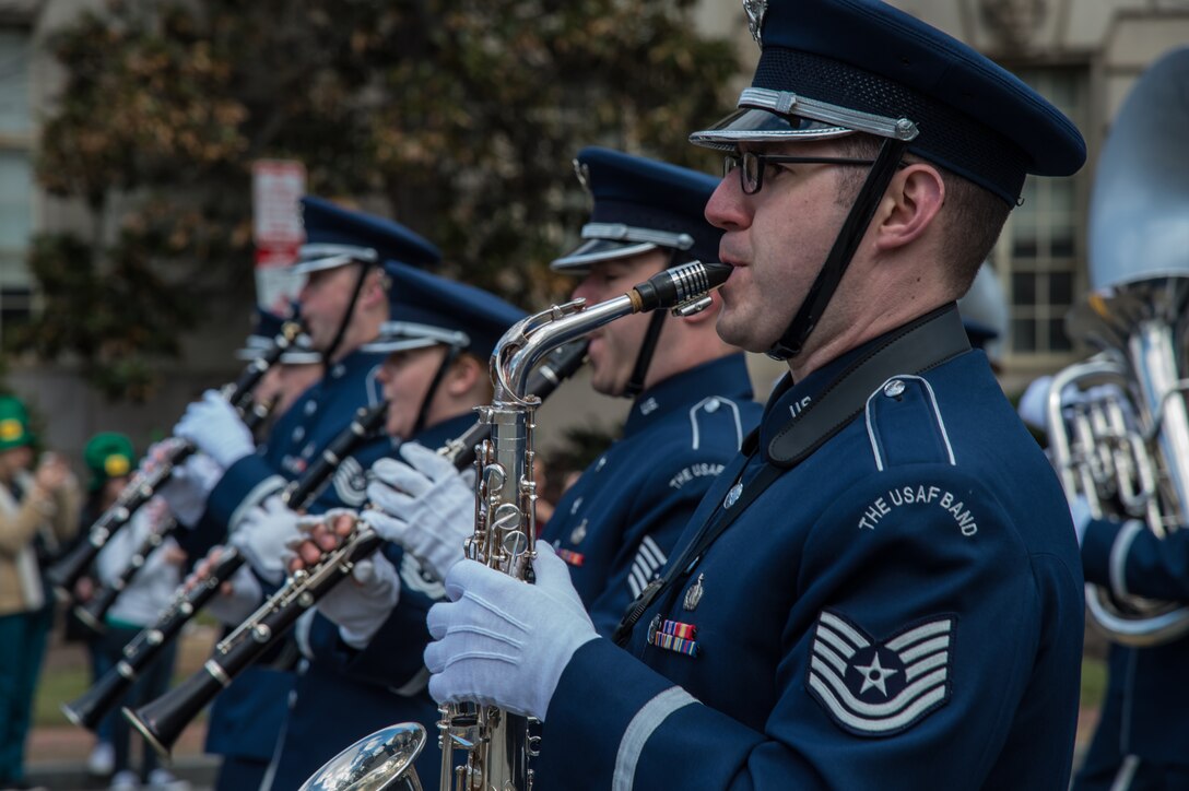 Tech. Sgt. Ricky Parrell, Concert Band baritone saxophone player, plays an alto saxophone during the 44th Annual St. Patrick’s Parade in Washington, D.C., March 15, 2015. (U.S. Air Force photo/Airman 1st Class Philip Bryant)