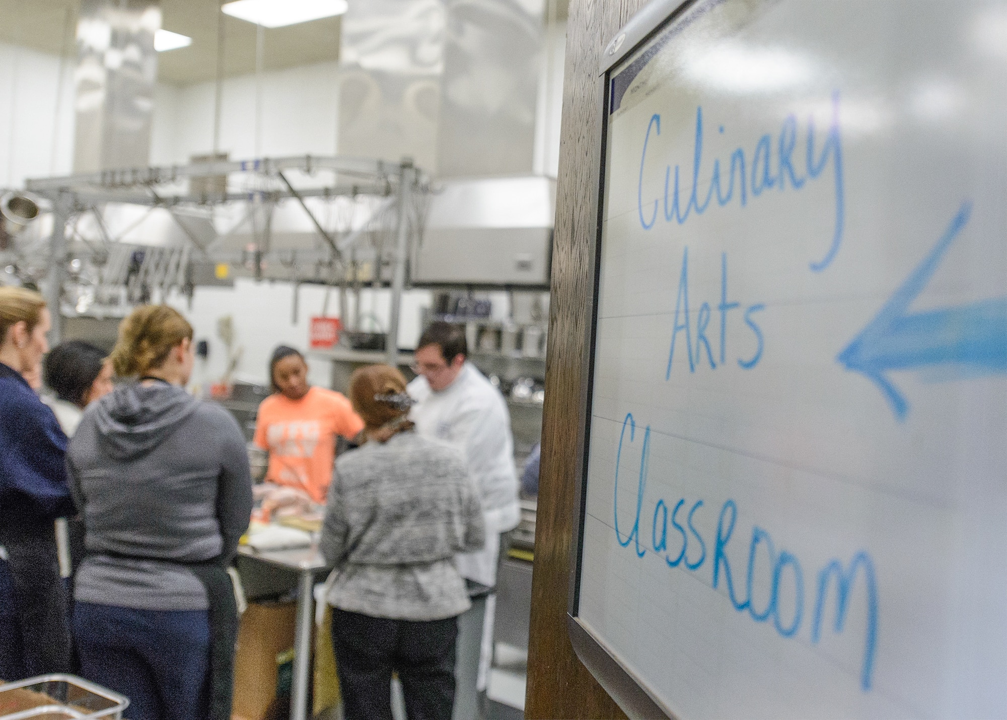 VANCE AIR FORCE BASE, Okla. – Team Vance learns from Chef Tyler Whitson at Autry Technology Center in Enid, March 2. The culinary class was the first of a four-class series offered via the Single Airman Program Initiative. (U.S. Air Force photo / David Poe)