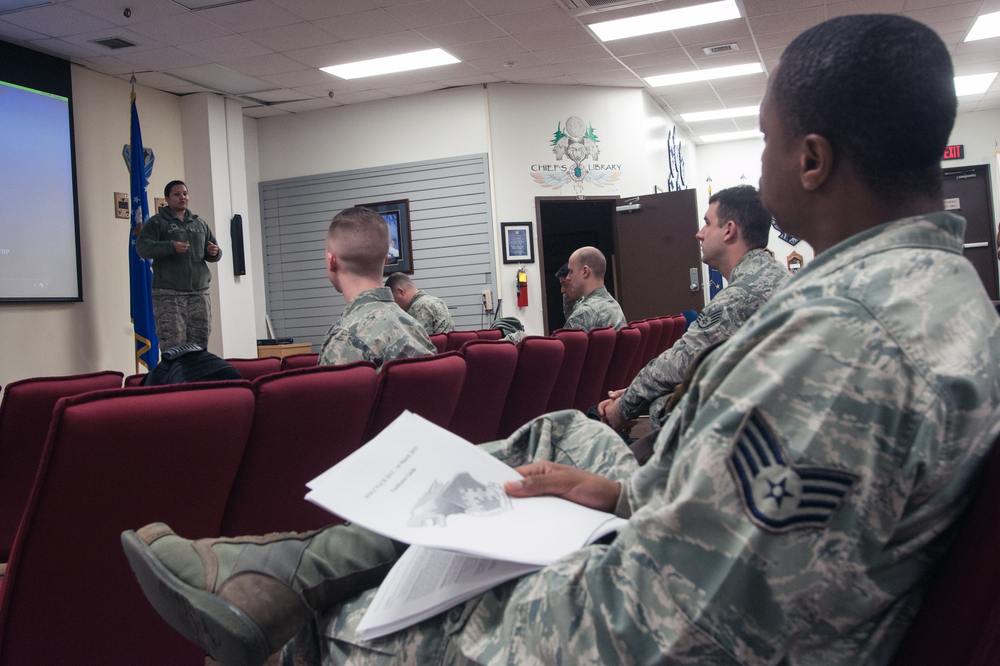 Capt. Claudia Santos, 8th Fighter Wing sexual assault response coordinator, leads the training for Wolf Pack Day unit facilitators at Kunsan Air Base, Republic of Korea, March 12, 2015. The facilitators led their units in group discussion during the following resiliency day and focused on suicide prevention. (U.S. Air Force photo by Senior Airman Taylor Curry/Released) 
