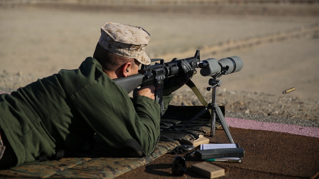 CW2 David Friedman, 3rd Light Armor Reconnaissance Battalion, fires modified M16 at a target 500 yards away during the 7th Regiment Midrange Rifle Competition aboard the Combat Center, March 14, 2015. The competitors of the event shot from the 300, 500, and 600 yard lines. 