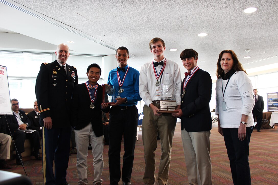 Winners of Engineering Career Day Overall event and James R. Garland Award for Engineering Excellence is Bishop Kenny High School, Team A.   From left are Lt. Col Mark Himes, Deputy Director, Jacksonville District, U.S. Army Corps of Engineers, Alan Conrad, Jeff DelaCruz, James Christian, Thad Daguilh and Vicki Schmidt, faculty advisor.   
