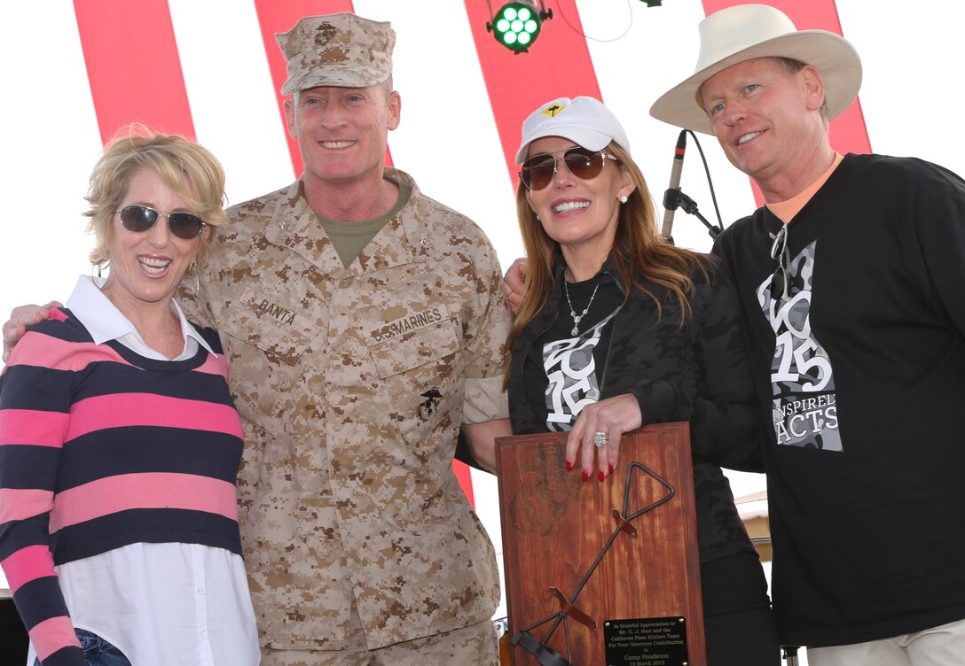 California Pizza Kitchen sent more than 700 Volunteers to assist School of Infantry – West Marines and Sailors to clean and renovate areas of San Onofre Beach, March 18. The groups broke up into three teams with one group painting and renovating the beach club, another handling landscaping and the third group painting the theatre and building playground equipment.