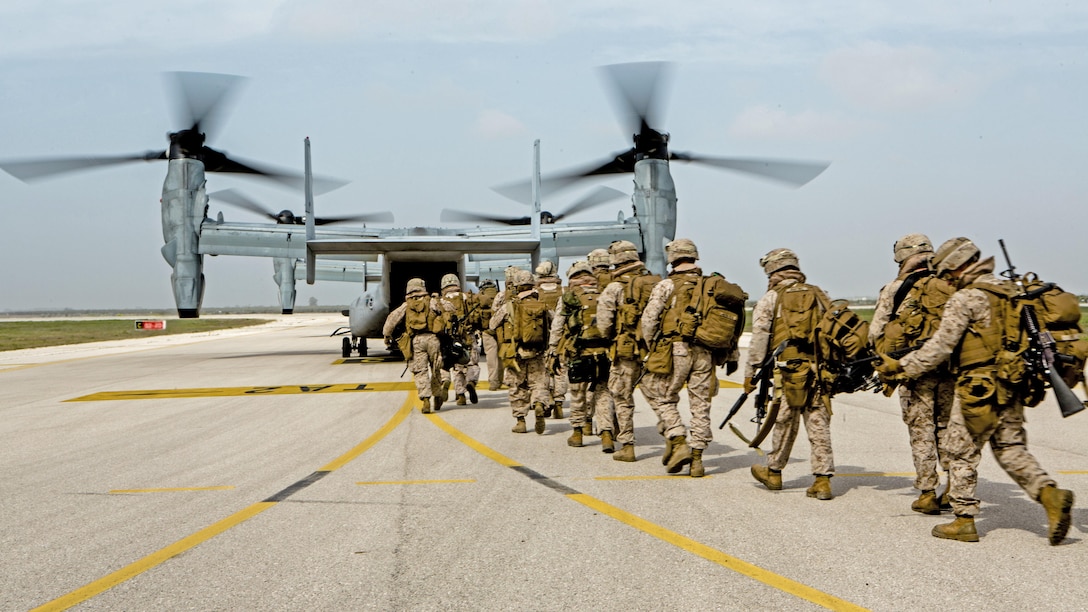 U.S. Marines with Special-Purpose Marine Air-Ground Task Force Crisis Response-Africa board an MV-22 Osprey during an alert force drill on Moron Air Base, Spain, March 13, 2015. The alert force tested its capabilities by simulating the procedures of reacting to a real-time crisis response mission by flying to Sigonella, Italy on a moment's notice.