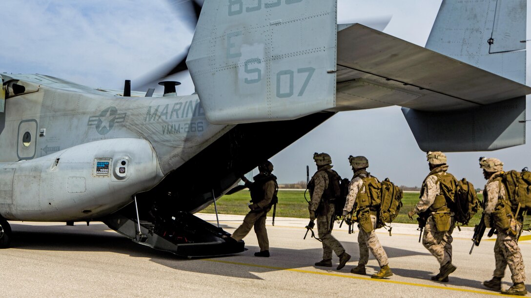 U.S. Marines with Special-Purpose Marine Air-Ground Task Force Crisis Response-Africa board an MV-22 Osprey during an alert force drill on Moron Air Base, Spain, March 13, 2015. The alert force tested its capabilities by simulating the procedures of reacting to a real-time crisis response mission by flying to Sigonella, Italy on a moment's notice. 