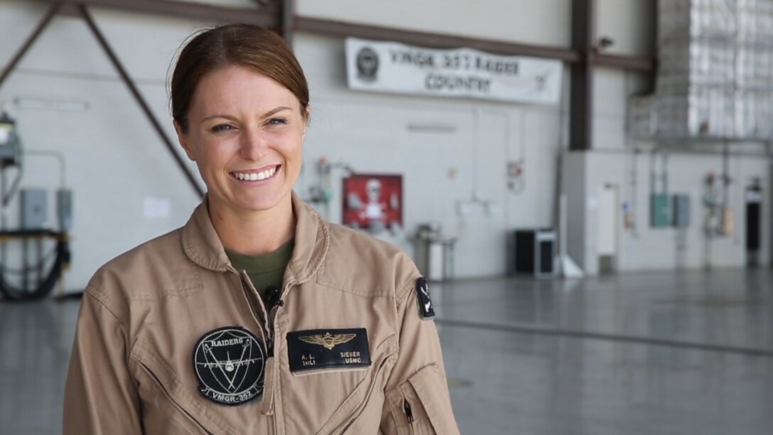 First Lt. Alisa Sieber, a pilot with Marine Aerial Refueler Transport Squadron (VMGR) 352 and a San Diego native, smiles as she gives an interview aboard Marine Corps Air Station Miramar, Calif., March 9.