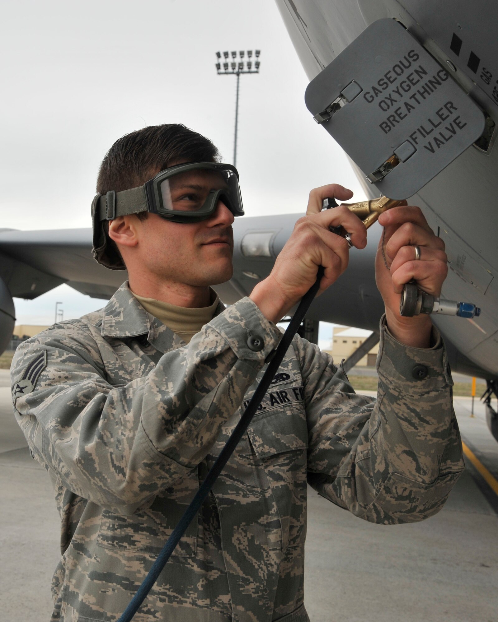 Senior Airman Mikhail Vaynshteyn, a 92nd Aircraft Maintenance Squadron assistant flying crew chief, works on a KC-135 Stratotanker March 19, 2015, at Fairchild Air Force Base, Wash. Vaynshteyn’s leadership selected him as one of Fairchild’s Finest, a weekly recognition program that highlights top-performing Airmen. (U.S. Air Force photo/Airman 1st Class Taylor Bourgeous)