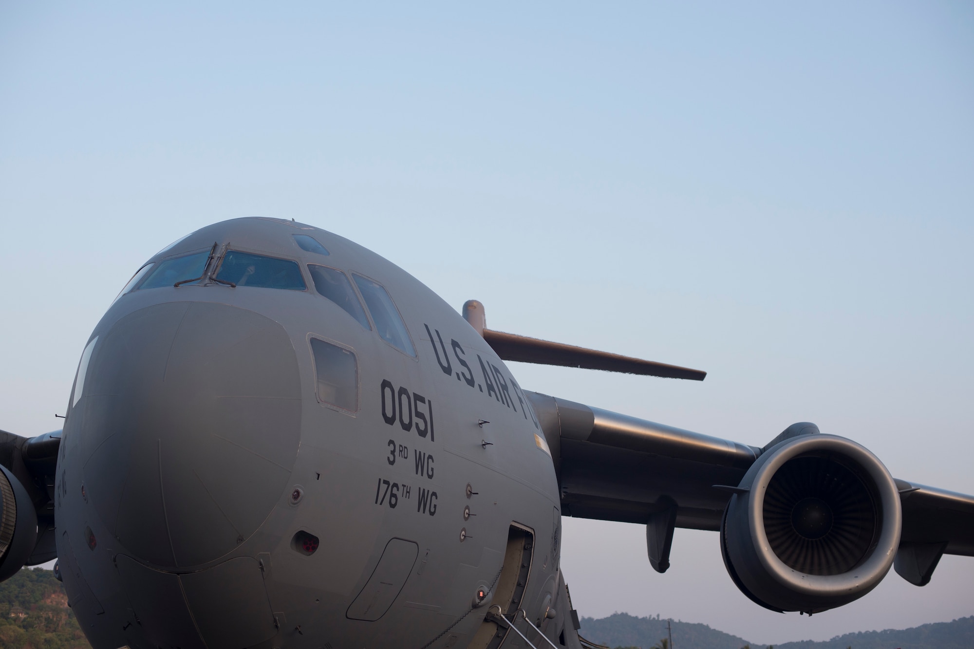 A C-17 Globemaster III assigned to the 3rd Wing, Joint Base Elmendorf-Richardson, Alaska, parks on the runway of the Langkawi International Airport after transporting a UH-1Y Huey from Marine Corps Station Hawaii to support the Langkawi International Maritime and Aerospace Exhibition, March 16, 2015. Defense Department participation in the LIMA 15 airshow strengthens military-to-military relationships and underscores the cooperation agreements between the U.S. and Malaysia. (U.S. Air Force photo by 1st Lt. Elias Zani/Released)