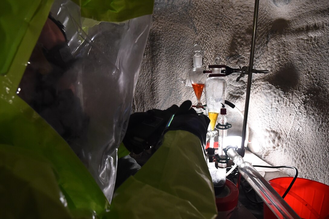 Staff Sgt. Jonathan Moroz, 779th Aerospace Medical Squadron NCO in-charge of bioenvironmental training, scans a mock chemical lab for chemical agents in the Memorial Tunnel at the Center for National Response in Gallagher, WV., March 17, 2015. This training is part of the annual Black Flag exercise for first responders. Moroz is stationed at Joint Base Andrews, Md. (U.S. Air Force photo/Airman 1st Class Joshua R. M. Dewberry)