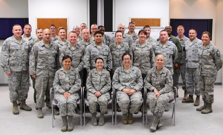 The class of 2015 stands proudly after graduating from the Senior Noncommissioned Officers Leadership Development Course at the 932nd Airlift Wing.  They spent many hours together working on team building projects, mental and physical challenges and leadership issues that will help all Airmen in the future.  (U.S. Air Force photo/Maj. Stan Paregien)