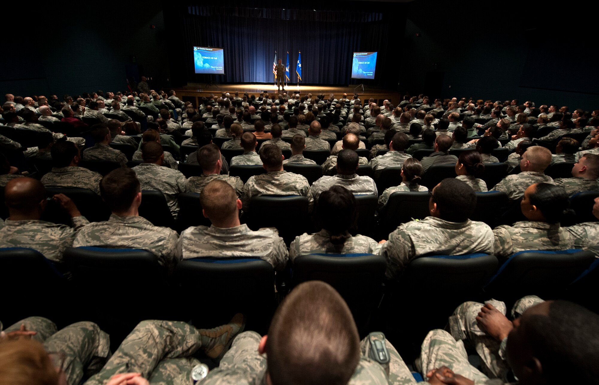 U.S. Air Force Gen. Hawk Carlisle, commander of Air Combat Command, discusses his priorities as ACC commander, wingmanship and the future of the military during a base-wide all call following an official visit to Joint Base Langley-Eustis, Va., March 13, 2015. After his remarks, Carlisle answered questions directly from JBLE Service members on a range of issues both Air Force-specific and Department of Defense-wide. (U.S. Air Force photo by Senior Airman R. Alex Durbin/Released)