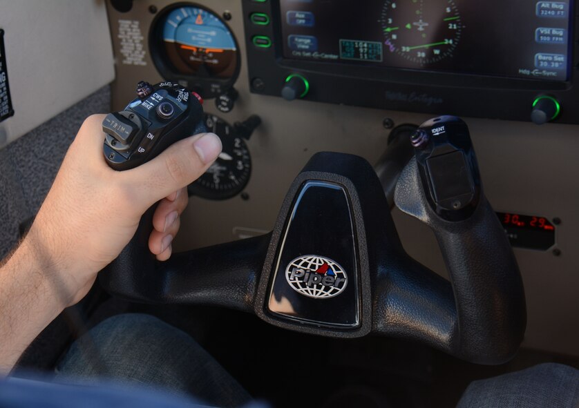 Staff Sgt. Brian Abbott, 660th Aircraft Maintenance Squadron KC-10 crew chief, mans the controls in the pilot seat of a Piper Archer III aircraft during an instrumentation flight high above Rio Vista, California March 5. Abbott, a certified pilot, was conducting his 10th instrumentation training flight. (U.S. Air Force Photo/Tech. Sgt. James M. Hodgman)
