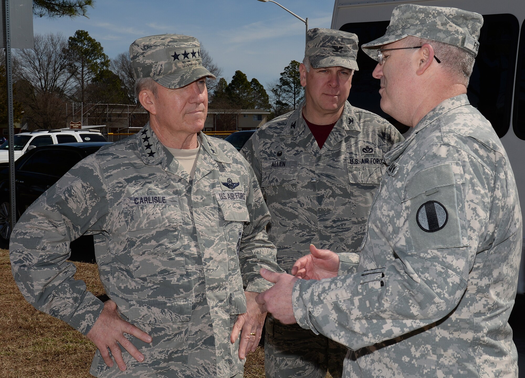 U.S. Air Force Gen. Hawk Carlisle, commander of Air Combat Command, speaks with U.S. Army Maj. Gen. Ross Ridge, Initial Training Center of Excellence deputy commanding general, during a visit to Fort-Eustis, Va., March 13, 2015. While at Fort Eustis, Carlisle viewed the Wall of Remembrance, a memorial honoring fallen U.S. Service members, and toured 3rd Port and Felker Army Airfield to learn about JBLE’s mission partners and their contributions at home and abroad. (U.S. Air Force photo by Staff Sgt. Teresa Cleveland/Released)