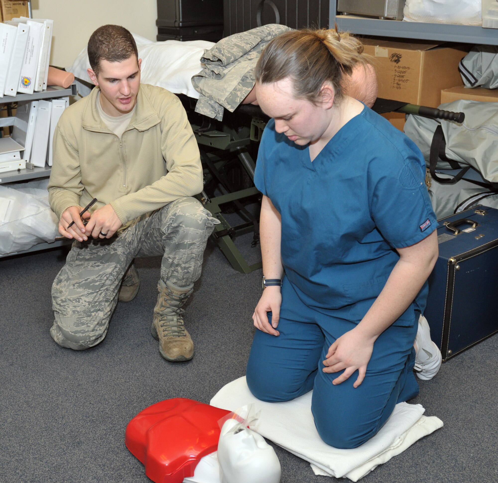 Staff Sgt. Tyler Briscoe, 109th Medical Group, evaluates a student's CPR skills during the regional SkillsUSA competition March 18. Students from Capital Region BOCES (Board of Cooperative Educational Services), Questar III, Washington-Saratoga-Warren-Hamilton-Essex BOCES and beyond were at Stratton Air National Guard Base, New York, to test their skills in carpentry, vehicle maintenance, heavy equipment operation, welding, nursing and more. (U.S. Air National Guard photo by Master Sgt. William Gizara/Released)