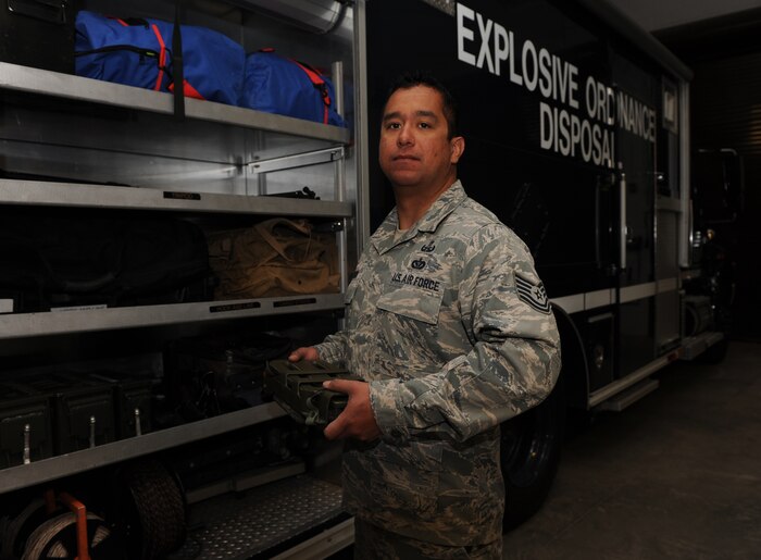 Tech. Sgt. Gabriel Wasnuk, holds a collapsible mine-detection device. Wasnuk is an explosive ordnance technician with the 775th EOD flight at Hill AFB, Utah. He is set to receive a purple heart March 25 for brain injuries sustained during combat deployments to Iraq and Afghanistan. (U.S. Air Force photo/Micah Garbarino)