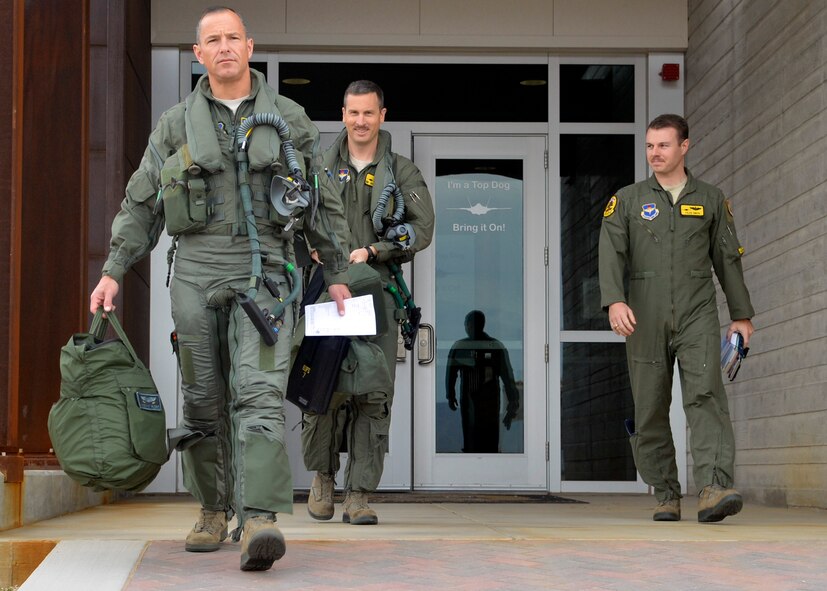 Brig. Gen. Scott Pleus, 56th Fighter Wing commander, steps to his first F-35 sortie flight at Luke Air Force Base, Ariz., March 18, 2015. Pleus will now be the first commander to switch to the F-35 on Luke AFB. (U.S. Air Force photo/Senior Airman Devante Williams)