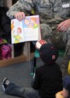 Volunteers from across the base read to children during the National Education Association’s “Read Across America” event on Minot Air Force Base, N.D., March 2-6, 2015. More than 90 Airmen and civilians volunteered at the Dr. Suess event.  This celebration occurs annually around Dr. Suess’ birthday. (U.S. Air Force photos/Senior Airman Kristoffer Kaubisch)