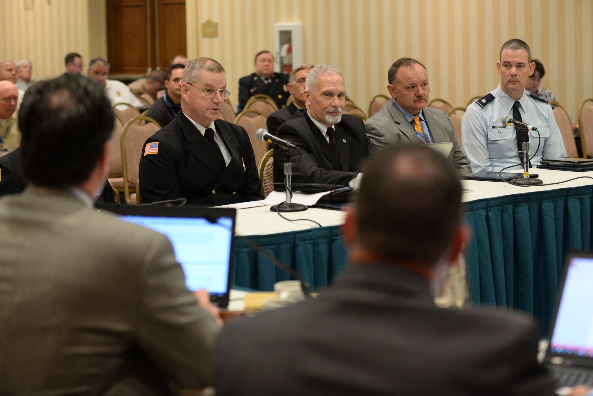 David Mounsey, 82nd Training Wing fire chief, answers questions in front of a panel of 10 board members from the Commission on Fire Accreditation International, at the Caribe Royale Hotel and Convention Center near Orlando, Fla., March 15, 2015. During the hearing, Sheppard Air Force Base, Texas, earned accreditation and joined 201 other fire departments who’ve earned the distinction. Sheppard shares the achievement with Maxwell AFB, Ala., as being the first in Air Education and Training Command to earn the honor. (U.S. Air Force photo by Tech. Sgt. Mike Meares) 