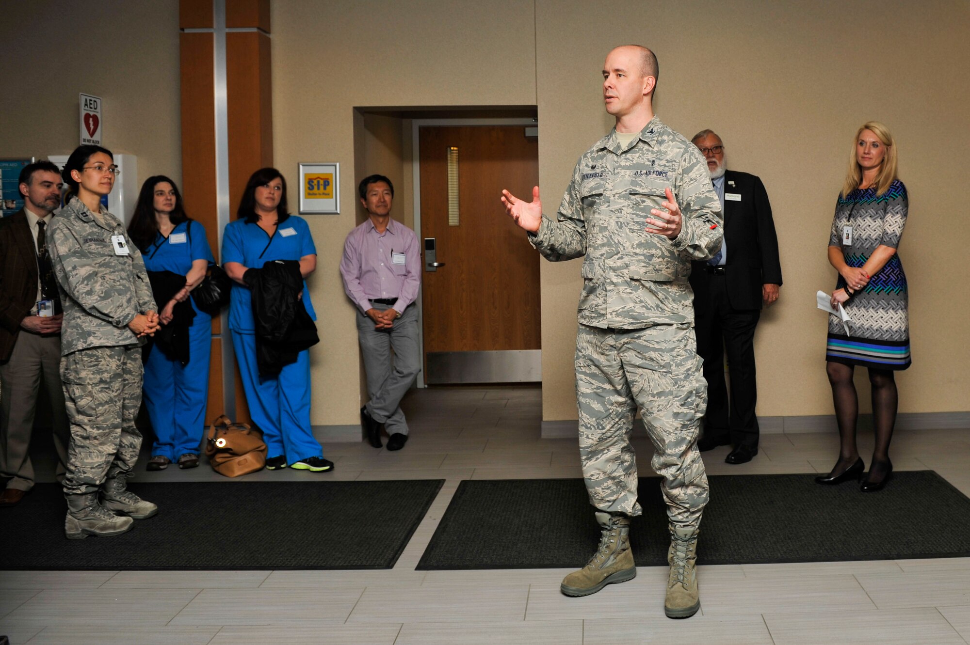 Col. Douglas Littlefield, 19th Medical Group commander, welcomes civilian medical providers to the Medical Providers Collaboration Event March 12, 2015, at Little Rock Air Force Base. The collaboration meeting was an opportunity for base and community medical providers to network and build relationships. (U.S. Air Force photo by Senior Airman Regina Edwards)  