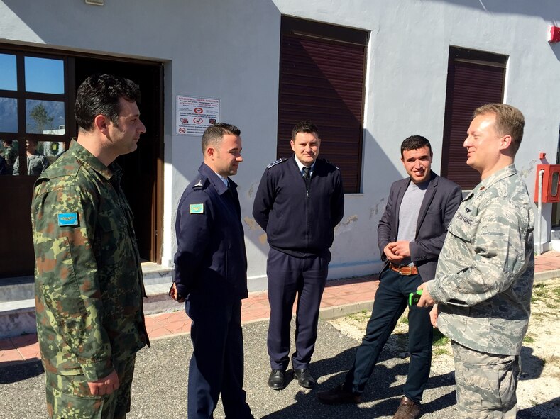 U.S. Air Force Maj. Christopher D. Potter, 603rd Air and Space Operations Center senior air defense officer discuss Control and Reporting Center training options with Albanian air force Capt. Olgert Koroveshi, comand and control operations chief at Rinas Air Base, Albania, March 5, 2015.  (U.S. Air Force photo/Maj. John C. Sherinian)