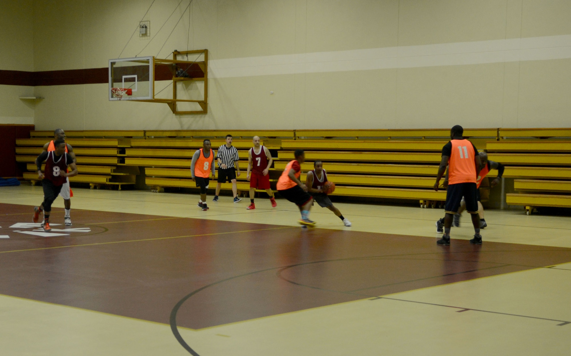The 39th Medical Group and the 39th Communications Squadron intramural basketball teams compete for the championship trophy March 17, 2015, at Incirlik Air Base, Turkey. The 39th MDG held the number one seed and the 39th CS held the third seed during the competition. (U.S. Air Force photo by Staff Sgt. Caleb Pierce/Released)