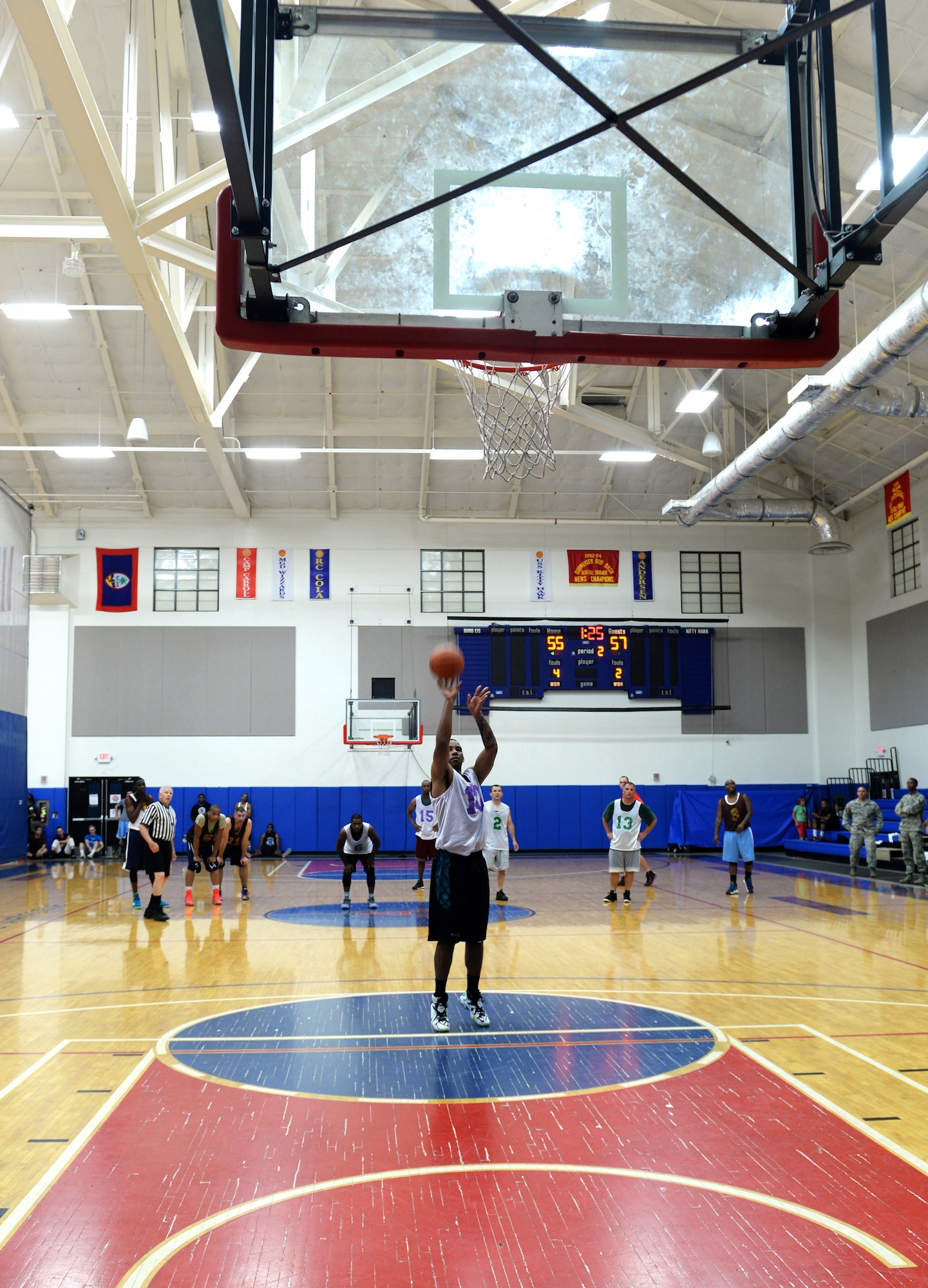 Mike Newsome, 36th Medical Group, shoots a free throw after being fouled during the over-thirty championship basketball game March 12, 2015, at Andersen Air Force Base, Guam. The 36th Security Forces Squadron defeated the 36th MDG 57-56 to win the championship overall. (U.S. Air Force photo by Senior Airman Amanda Morris/Released)