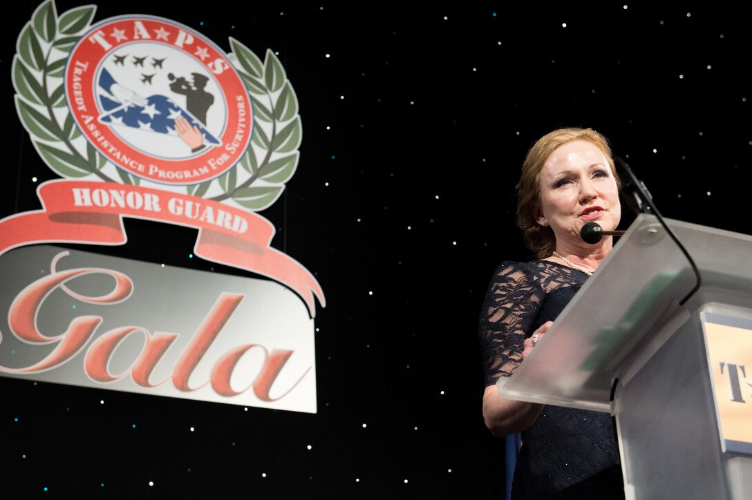 Patricia Bye, surviving mother of Coast Guard Petty Officer Jeffrey Svoboda, speaks after receiving the Ted Stevens Leadership Award during the Tragedy Assistance Program for Survivors Honor Guard Gala at the National Building Museum in Washington, D.C., March 18, 2015.