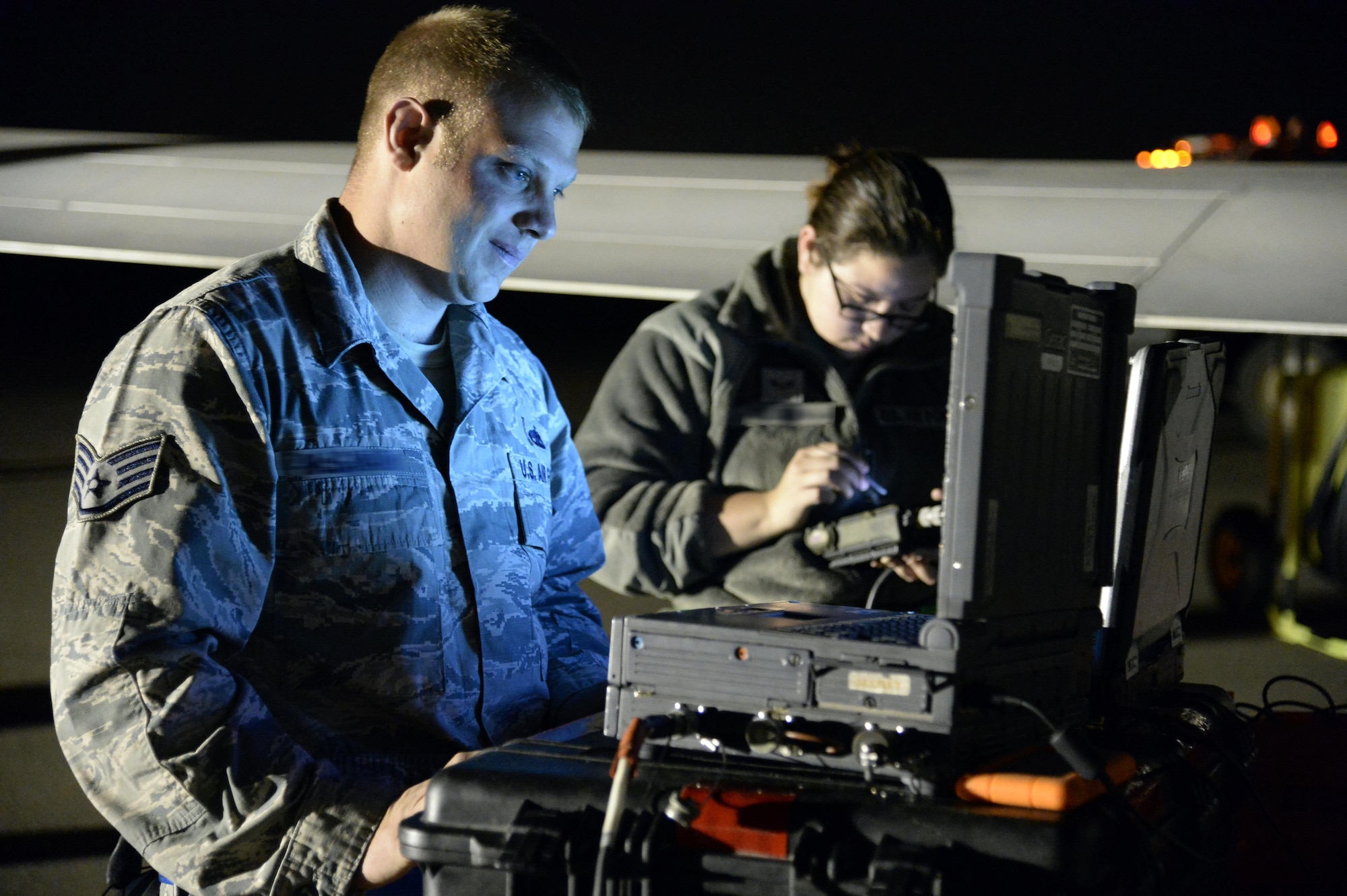 Staff Sgt. Paul, crew chief, uses the vehicle test controller for a RQ-4 Global Hawk at an undisclosed location in Southwest Asia Mar. 7, 2015. The vehicle test controller controls the aircraft on the ground to start the engine and configure the aircraft for flight. Paul is currently deployed from Grand Forks Air Force Base, N.D., and is a native of Pittsburgh, Pa. (U.S. Air Force photo/Tech. Sgt. Marie Brown)