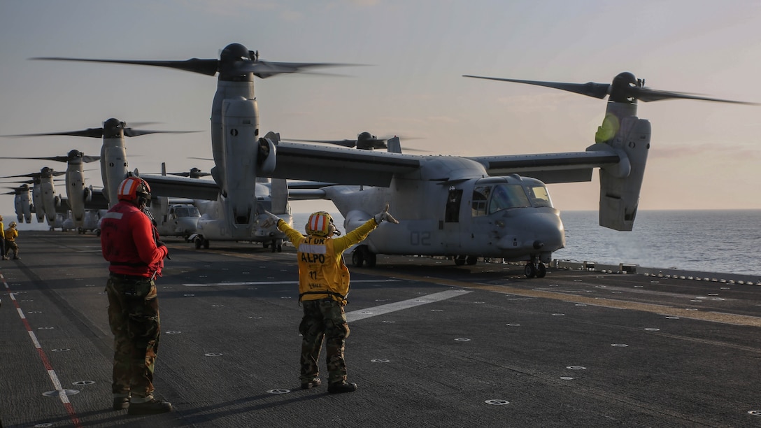 U.S. Marine Corps MV-22B Ospreys prepare to take off from the flight deck of the USS Bonhomme Richard (LHD 6), at sea, March 19, 2015. The Ospreys are transporting Marines to Ie Shima, Okinawa, Japan, for a vertical assault exercise. The Ospreys are with Marine Medium Tiltrotor Squadron 262 (Reinforced), 31st Marine Expeditionary Unit. The Marines are with Company E, Battalion Landing Team 2nd Battalion, 4th Marines, 31st MEU and, are currently on the MEU’s annually-scheduled Spring Patrol of the Asia-Pacific region.