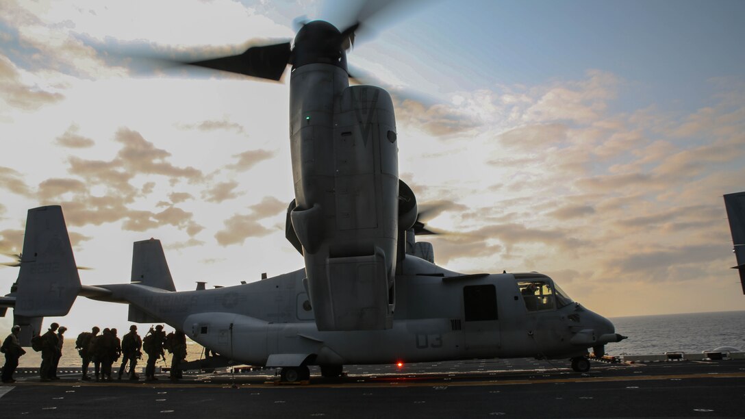 U.S. Marines walk towards a MV-22B Osprey on the flight deck of the USS Bonhomme Richard (LHD 6)  March 19, 2015. The Marines are preparing for a vertical assault exercise on Ie Shima, Okinawa, Japan. The Ospreys are with Marine Medium Tiltrotor Squadron 262, 31st Marine Expeditionary Unit. The Marines are with Company E., Battalion Landing Team 2nd Battalion, 4th Marines, 31st MEU and are currently participating in Certification Exercise during their Spring Patrol of the Asia-Pacific region. 