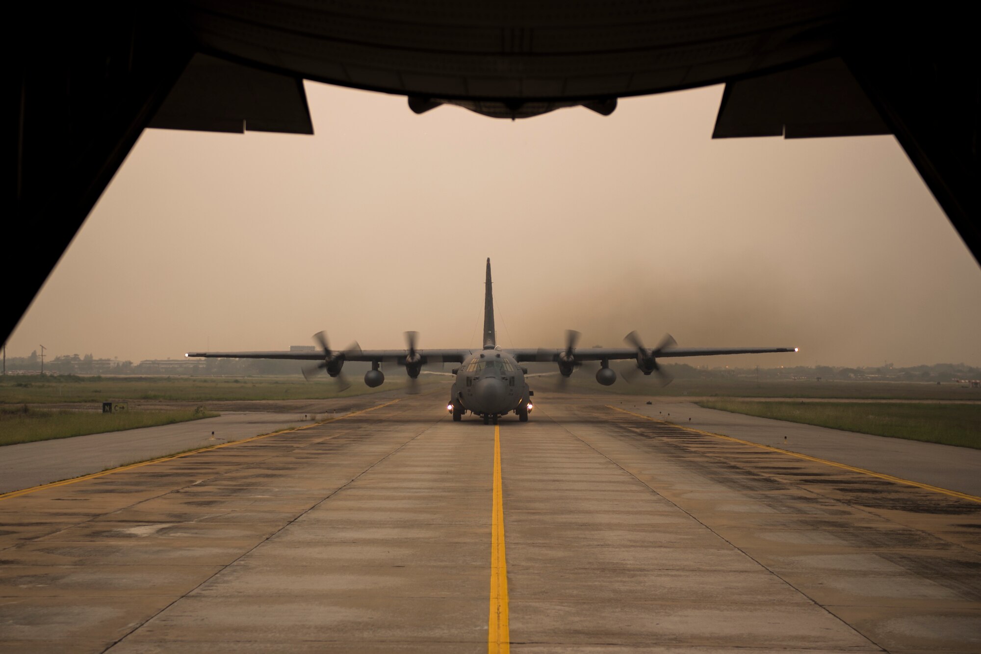 A C-130 Hercules taxis after a formation flight during exercise Cope Tiger 15 March 17, 2015, in Udonthani, Thailand. CT15 included 22 total flying units and over 1390 personnel from three countries and continues the growth of strong, interoperable, and beneficial relationships within the Asia-Pacific region. The exericse focused on integration of airborne and land-based command and control assets. (U.S. Air Force photo/Airman 1st Class Taylor Queen)