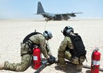 Members from the 81st Expeditionary Rescue Squadron prepare fuel hoses from an HC-130 Combat King as part of a forward arming and refuel point exercise at Grand Bara, Djibouti on Mar 12, 2015. Providing a FARP allowed several smaller airframes to refuel with engines still running, enabling the aircraft to fly missions almost non-stop.
