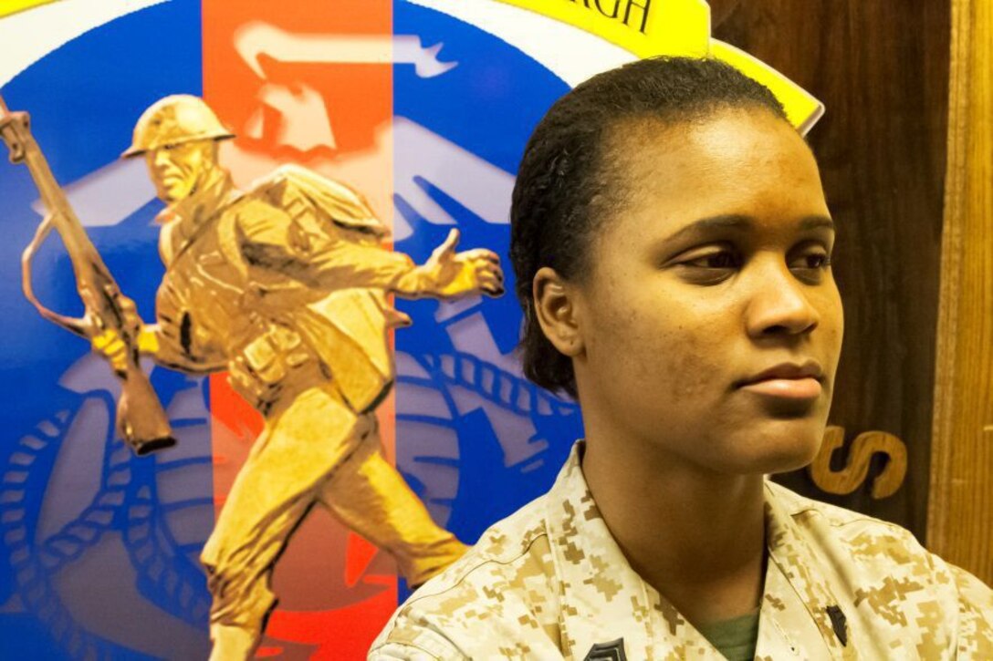 PITTSBURGH--Sgt. Kemmala S. Kelsey reflects on her path in life that led her to become one of the “Few and The Proud,” at Recruiting Substation Pittsburgh, March 17. “Initially, I was overweight and I couldn’t enlist,” said Kelsey, a supply clerk with Recruiting Station Pittsburgh. “I took that as a personal challenge. So I said to myself, I’m going to lose this weight and I’m going to show the recruiters that I can do this.” Kelsey, who lost the weight, had recently relocated from Jamaica to Chicago. She would eventually join the Marines and travel to Japan, Guam and Spain.