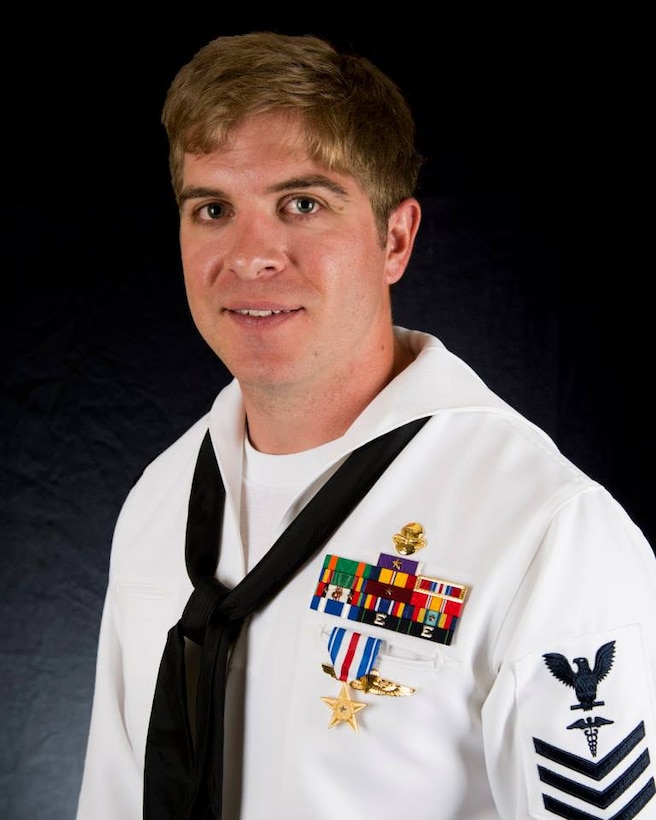 Petty Officer 1st Class, Kevin D. Baskin, a Special Amphibious Reconnaissance Corpsman with 3d Marine Special Operations Battalion received the Silver Star Medal in a ceremony at Stone Bay aboard Marine Corps Base Camp Lejeune, N.C., March 20, 2015.