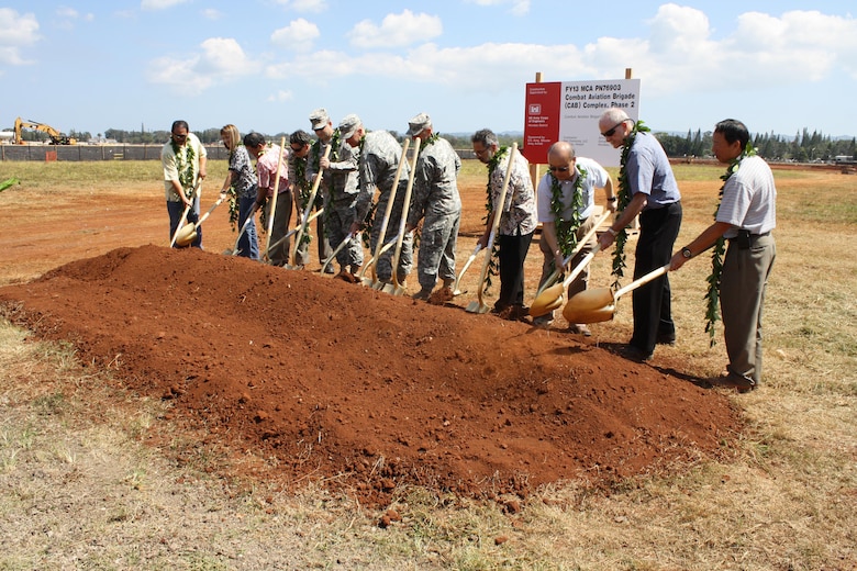 WHEELER ARMY AIRFIELD, Hawaii- Representatives from the U.S. Army Corps of Engineers-Honolulu District, U.S. Army Garrison-Hawaii Directorate of Public Works, the 25th Infantry Division Combat Aviation Brigade (CAB), and contractor Nan-Samsung LLC conduct the ceremonial groundbreaking for Phase 2 of the 25th ID CAB complex on the south side of the Wheeler airstrip.  The $69.7 million project is the second of 16 additional phases required to complete the entire $1.6 billion CAB complex. This project constructs two, six-story standard design barracks for Soldiers assigned to the Combat Aviation Brigade. 