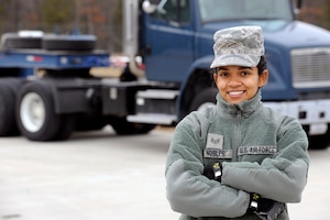 150319-Z-EZ686-515--Staff Sgt. Nobles, a member of the Michigan Air National Guard’s 127th Logistics Readiness Squadron, stands next to the 40-foot trailer truck she drove carrying 15 pallets weighing 9,000 pounds of materials from Selfridge Air National Guard Base – her home base– to the Alpena Combat Readiness Training Center Mich., on March 19, 2015.  Nobles is one of nine Airman from the 127th LRS who recently supported the Michigan Army National Guard 's119th Field Artillery mobilization exercise. (U.S. Air National Guard photo by MSgt. David Kujawa/Released)