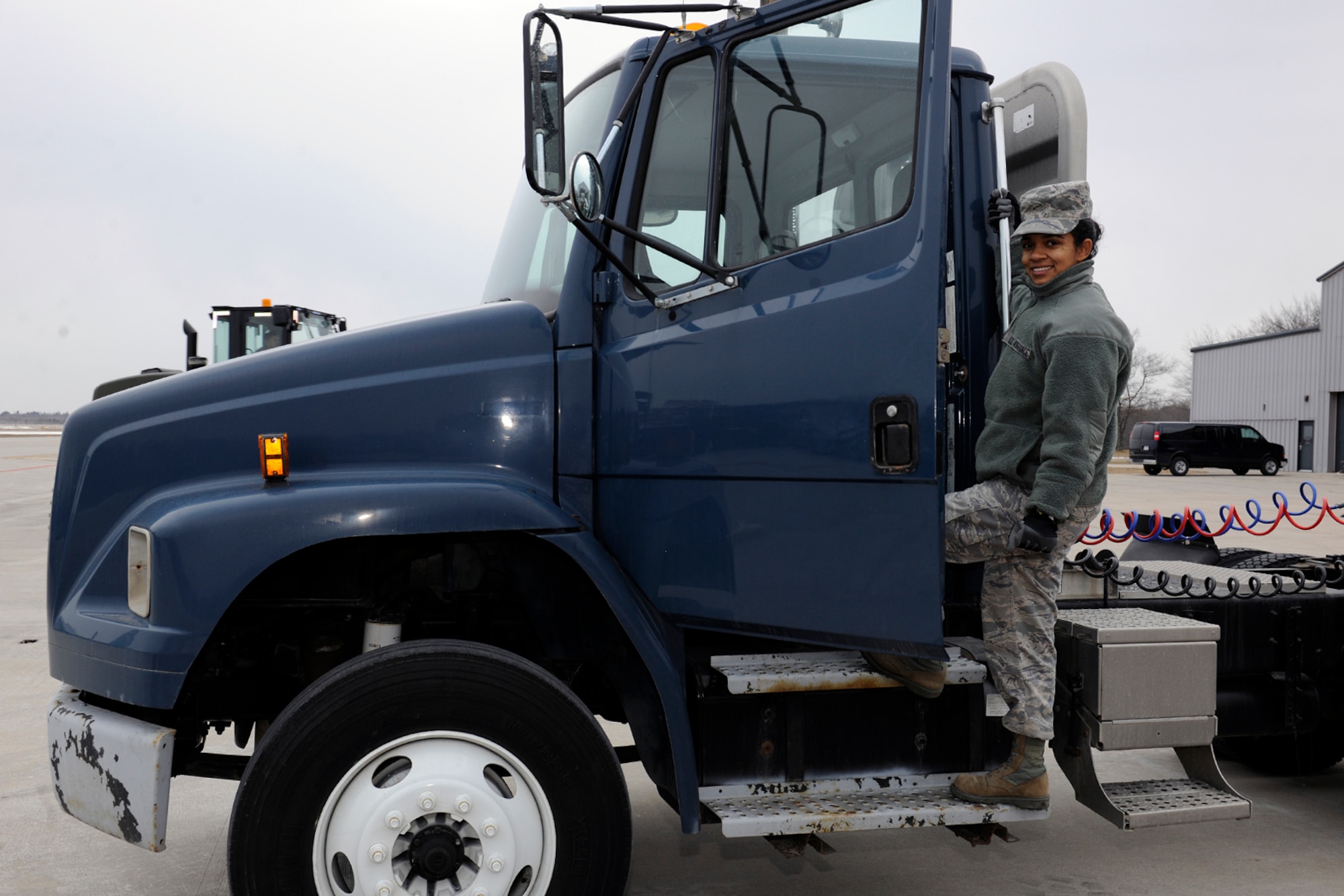 150319-Z-EZ686-506--Staff Sgt. Nobles, a member of the Michigan Air National Guard’s 127th Logistics Readiness Squadron, prepares to board the 40-foot trailer truck she drove carrying 15 pallets weighing 9,000 pounds of materials from Selfridge Air National Guard Base – her home base– to the Alpena Combat Readiness Training Center Mich., on March 19, 2015.  Nobles is one of nine Airman from the 127th LRS who recently supported the Michigan Army National Guard 's 119th Field Artillery mobilization exercise. (U.S. Air National Guard photo by MSgt. David Kujawa/Released)