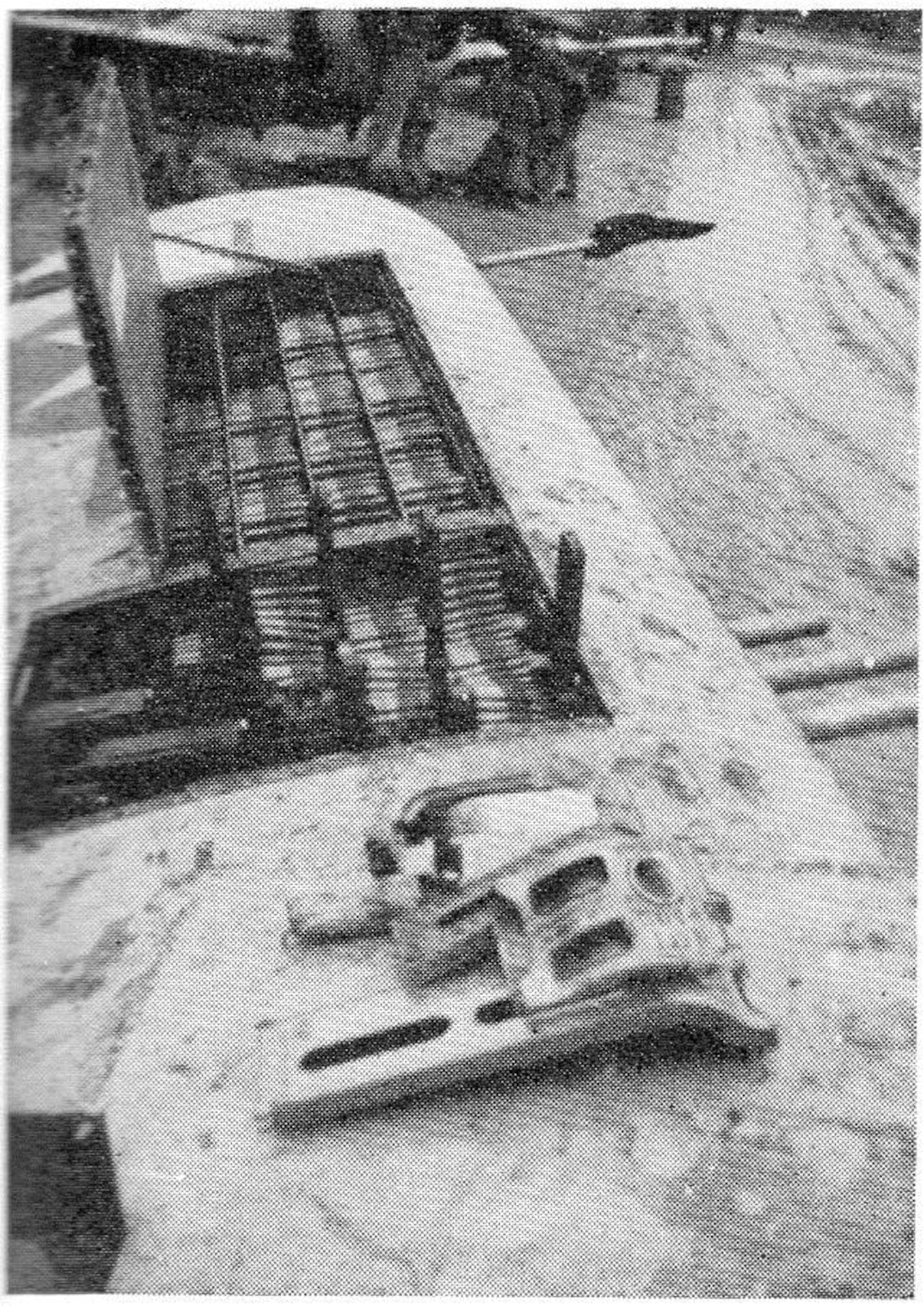 Squadron armorers have loaded the ammunition bays for this 371st Fighter Group P-47 Thunderbolt, possibly at Metz Airfield in early 1945.  The staggered position of the four machine guns in the wing allowed for the direct feed of .50 caliber machine gun ammunition from the corresponding tray.  Muddy conditions were a bother but did not prevent the servicing of the fighters to accomplish the mission.  The P-47 could carry up to 425 rounds per gun, but there was a tradeoff with the weight in performance and range, and often fewer rounds were carried, often closer to 300 rounds.  (The Story of the 371st Fighter Group in the E.T.O.)