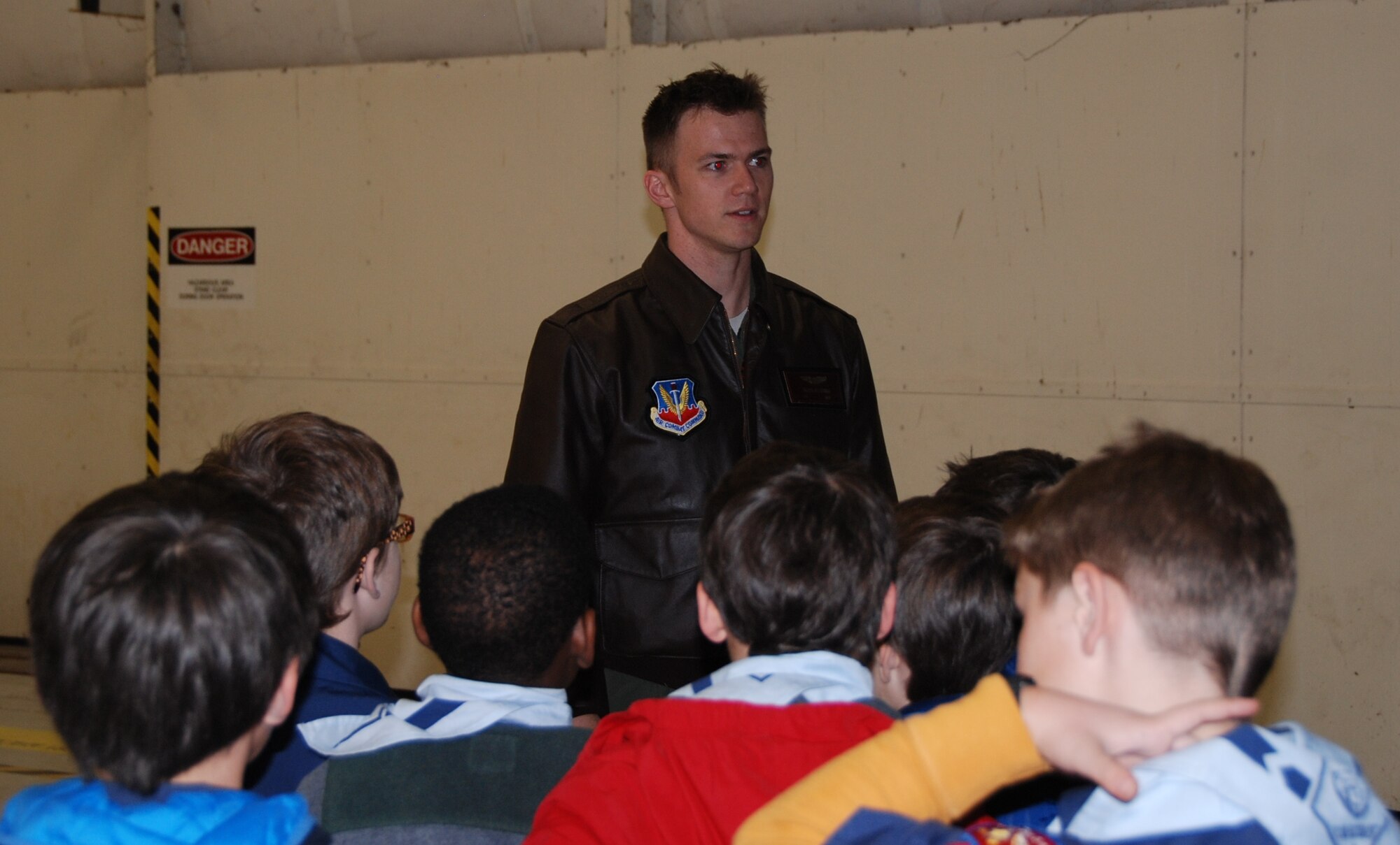 NAVAL AIR STATION FORT WORTH JOINT RESERVE BASE, Texas - First Lieutenant Nicolas Hanna, an active duty pilot assigned to Detachment 457 here, talked about his position and training Feb. 26 to approximately 30 cub scouts and parents during a base tour. (U.S. Air Force photo/Staff Sgt. Melissa Harvey) 