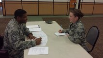Chief Master Sgt. Phillip Easton, (left) 341st Missile Wing command chief evaluates and provides Staff Sgt. Shelby McCrief 819th RED HORSE operations management craftsman, with feedback on enlisted performance reports and future promotion packages during the Pathway to Promotion Program March 17 at Malmstrom Air Force Base, Mont. The program is provides Airmen and non-commissioned officers with a one-on-one mock promotion board evaluation. (Courtesy photo)