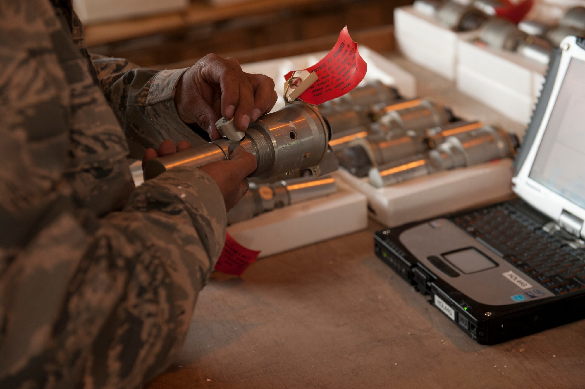 Tech. Sgt. Ernesto Vela, 49th Wing Conventional Munitions Crew Member, prepares part of a Mark 82 bomb’s ignition system during a routine build that will be used for training new F-16 aircraft pilots under the 54th Fighter Group at Holloman Air Force Base/White Sands Missile Range, N.M., March 17, 2015. The 54th is a newly activated training group that specializes in training F-16 aircraft pilots for future deployments. The Mark 82 is the perfect munition for training in a controlled environment, and has a rich history in the Air Force dating back to before the Vietnam War.