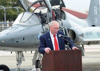 Gary Baber, addresses the crowd during the 560th Flying Training Squadron Artifact Dedication ceremony and open house March 20 at Joint Base San Antonio-Randolph. The annual event, in conjunction with the 42nd Freedom Flyer Reunion and 18th Annual POW/MIA Symposium, honors all POWs held captive during the Vietnam War. The tradition began when members of the 560th Flying Training Squadron were given the task to retrain more than 150 POWs returning to flying status. Smith’s aircraft was shot down during a mission over North Vietnam Oct. 25, 1967, and was held captive by the North Vietnamese until his release March 14, 1973. (U.S. Air Force Photo by Harold China/released)