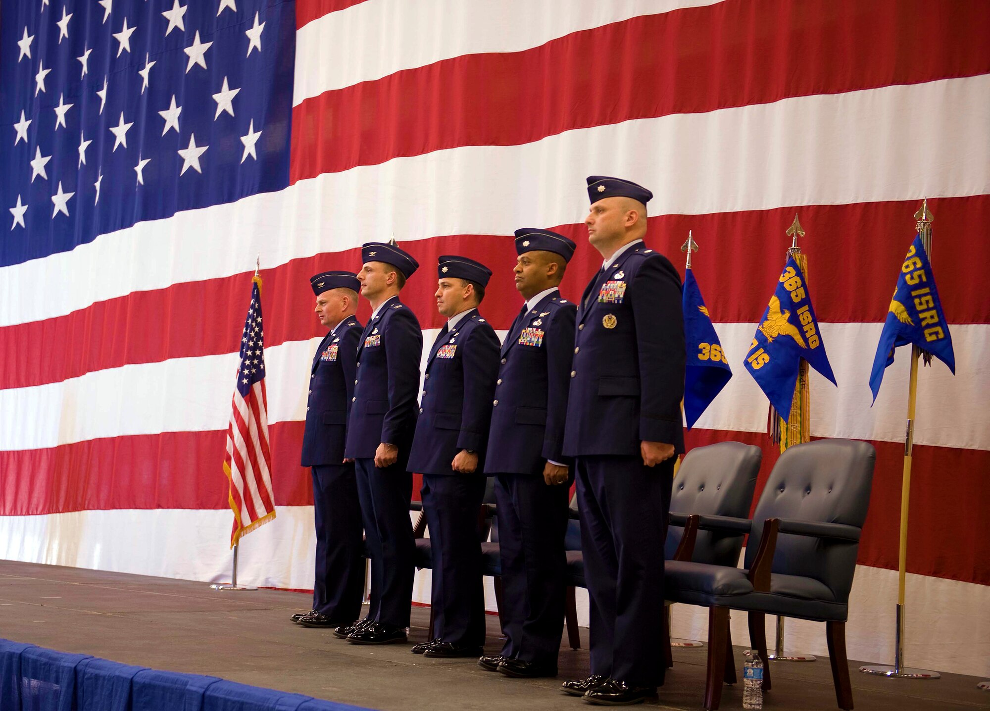 The 365th Intelligence, Surveillance and Reconnaissance Group held an activation ceremony at Nellis Air Force Base, Nev. March 13, 2015. The ceremony included the activation, assumption of command by Col. Michael. W. Johanek, as well as the realignments of the 547th Intelligence Squadron, 526th IS and the 15th IS. The 365th ISR Group is the Air Force lead for all-source analysis and content-dominant analysis in support of airpower employment focusing on threat tactics, characteristics and capabilities from an adversary air, air defense, cruise and ballistic missile, space and ISR perspective. (U.S. Air Force photo by Airman 1st Class Rachel Loftis)
