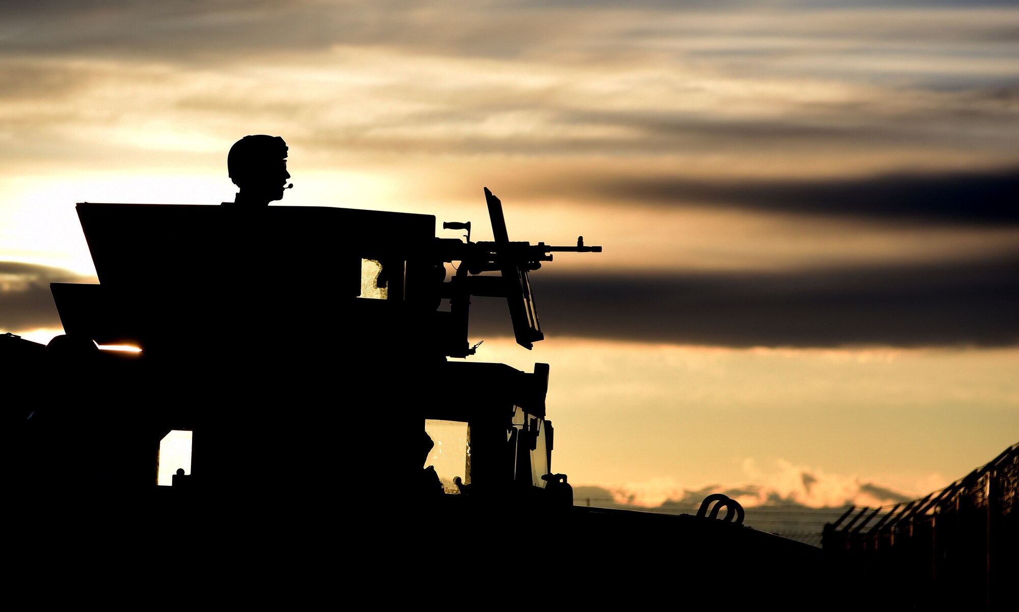 A member of the 341st Security Forces Group guards a missile launch facility during an LF recapture simulation as part of the Grizzly Rampart training exercise March 18 near Malmstrom Air Force Base. The exercise was implemented to evaluate the readiness of the 341st Missile Wing and ensure first-responder Airmen know and follow the standards set in place for real-world events. (U.S. Air Force photo/Airman 1st Class Collin Schmidt)