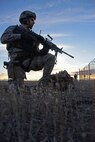 A member of the 341st Security Forces Group guards a missile launch facility during an LF recapture simulation as part of the Grizzly Rampart training exercise March 18 near Malmstrom Air Force Base. The exercise was implemented to evaluate the readiness of the 341st Missile Wing and ensure first-responder Airmen know and follow the standards set in place for real-world events. (U.S. Air Force photo/Airman 1st Class Collin Schmidt)