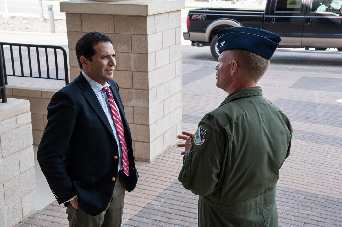 Representative Poncho Nevárez, Texas House of Representatives District 74, meets Col. Darrell Judy, 47th Flying Training Wing vice commander, on Laughlin Air Force Base, Texas, March 19, 2015. Nevárez represents 12 Texas counties, including Val Verde County where Laughlin resides, and he visited the base to familiarize himself with its mission and the Air Force in general. (U.S. Air Force photo by Staff Sgt. Nathan Maysonet) (Released)