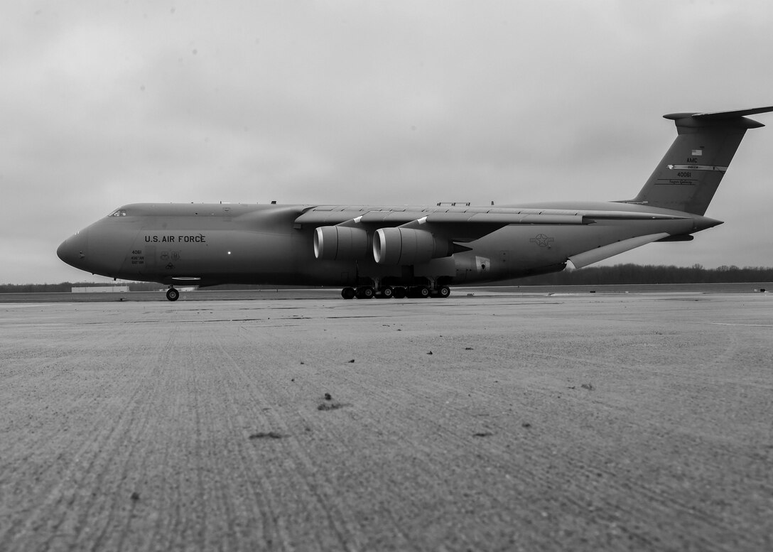 A C-5 Super Galaxy cargo aircraft from Dover Air Force Base, Delaware, taxis on the ramp at Youngstown Air Reserve Station March 20, 2015. The aircraft came to YARS to pick up approximately 90 thousand pounds of cargo for transport to Guatemala via the Denton Program. The cargo, which included school supplies, medical items and furniture, was collected by Austintown based Mission of Love charity and packaged onto 33 Air Force pallets by members of the 76th Aerial Port Squadron, based here. U.S. Air Force photo/Eric M. White.