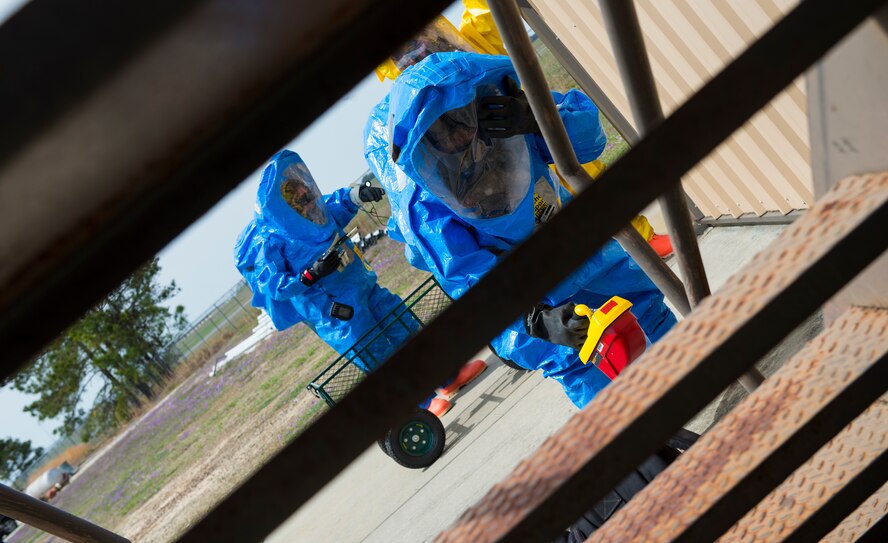 U.S. Air Force Airman 1st Class Matthew Manzano, 23d Medical Group bioenvironmental flight technician, uses a radiation-detection meter during an integrated base emergency response capability training March 18, 2015, at Moody Air Force Base, Ga. Manzano conducted facility surveillance before entering the building to begin one of three scenarios held during the week-long exercise. (U.S. Air Force photo by Airman 1st Class Ceaira Tinsley/Released)